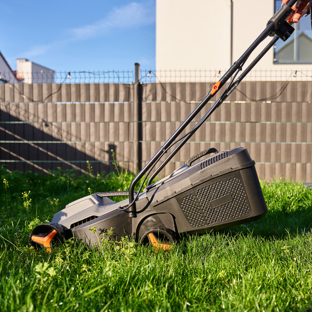 Professional summer lawn mowing service in UAE by Clean Deal Gardens maintaining healthy green grass
